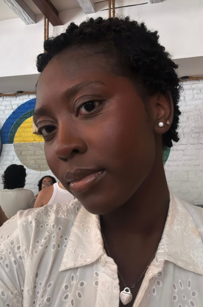 Selfie of Black woman with a 4C pixie haircut