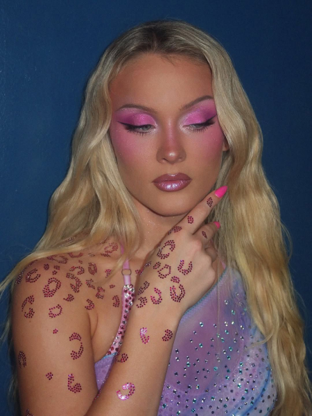 Image may contain Zara Larsson Blonde Hair Person Face Head Skin and Tattoo