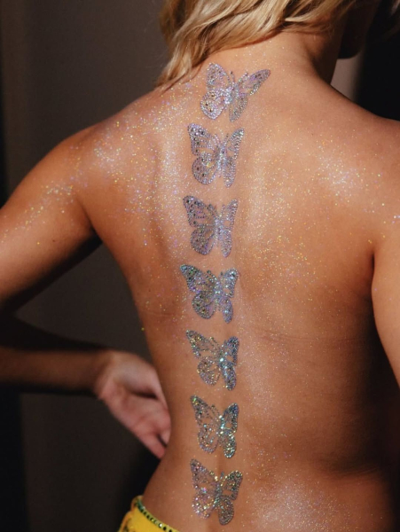 Summer 2026 Trend Zara Larsson butterfly glitter tattoos on back
