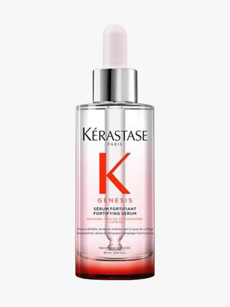 Kérastase Genesis Strengthening Scalp and Hair Serum in branded dropper component on a light gray background