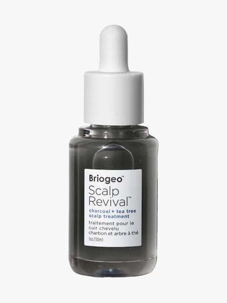 Briogeo Scalp Revival Charcoal + Tea Tree Serum in branded dropper component on a light gray background