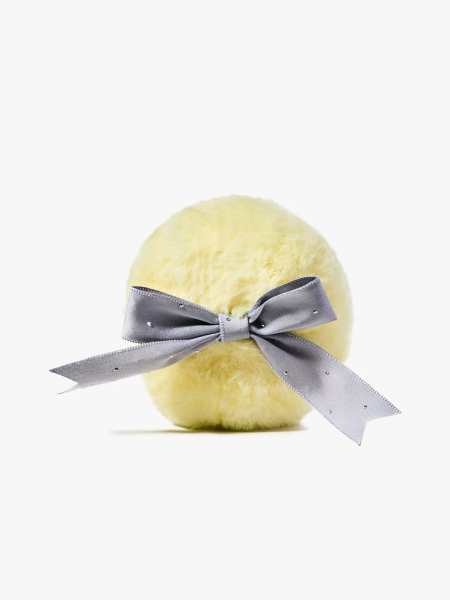 Junoco Pear Glimmer Puff in branded component on a light gray background